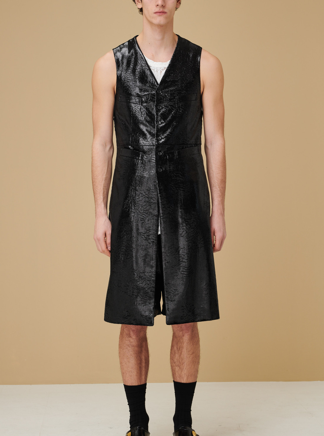 Sleeveless coat