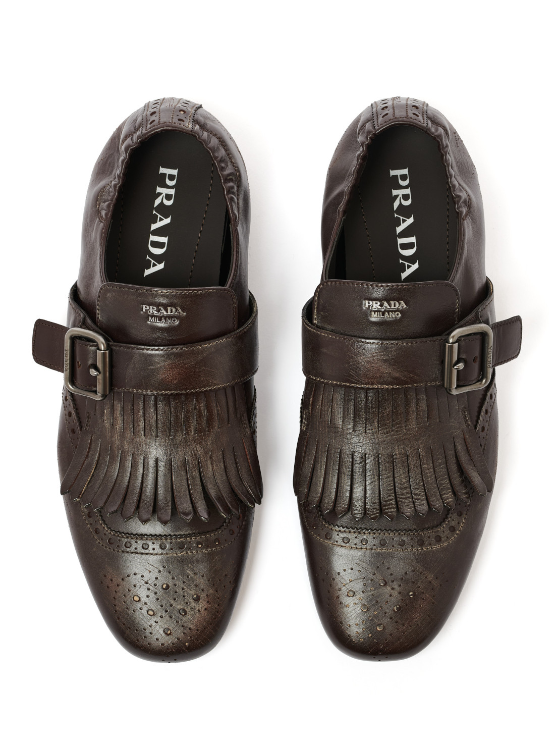 Chaussures à boucle et franges