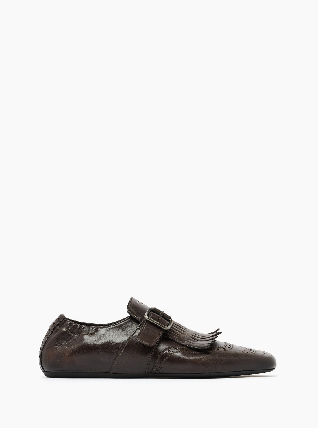 Chaussures à boucle et franges