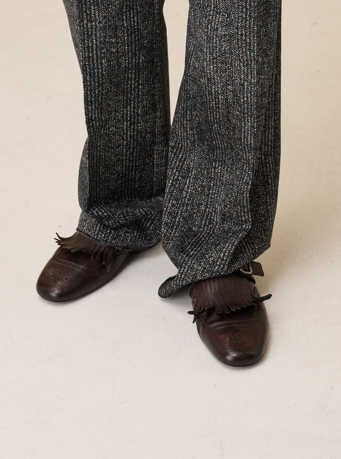 Chaussures à boucle et franges