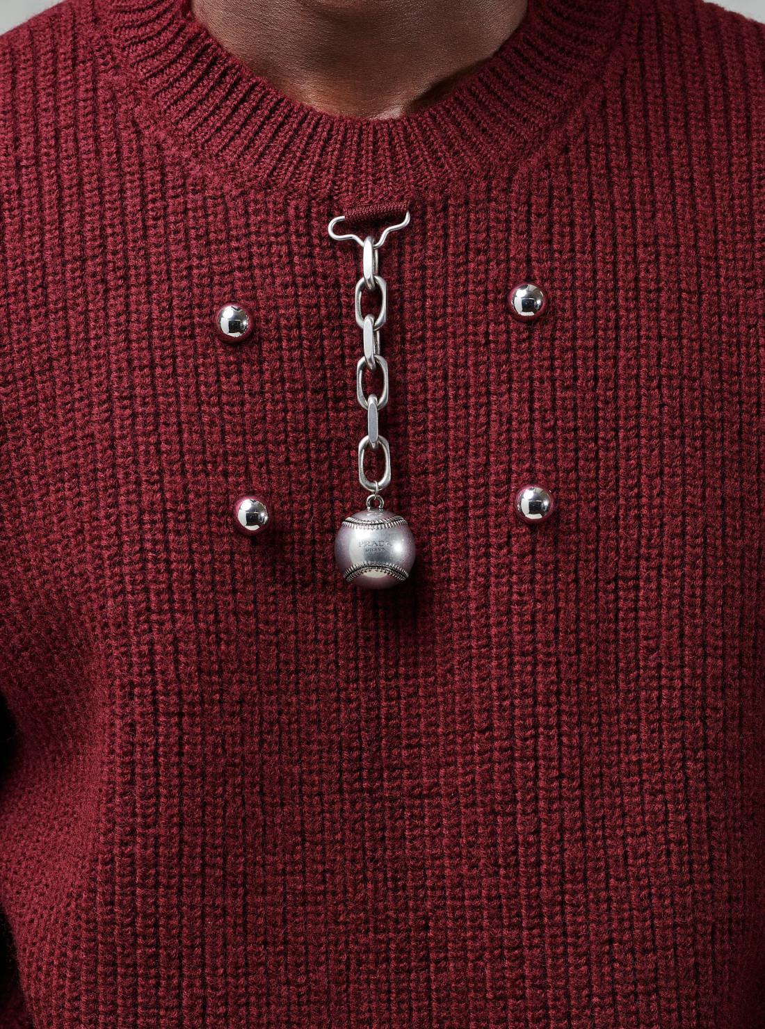Wool crew-neck sweater with pendant